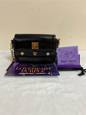MCM PATENT SHOULDER BAG BLACK